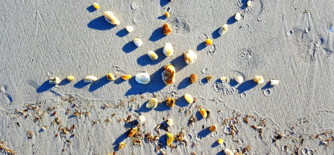 Étoile d&rsquo;or sur la plage d&rsquo;argent
